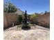 Backyard fountain feature adding a tranquil touch to the outdoor space at 8981 W Tuckey Ln, Glendale, AZ 85305