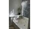 Sunlit tub with plants at 8981 W Tuckey Ln, Glendale, AZ 85305