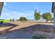 Large, flat backyard with newly installed block fence and plenty of space at Xxx S Hunt Hwy, Queen Creek, AZ 85142