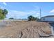 Large backyard with gravel, block wall, and potential for customization at Xxx S Hunt Hwy, Queen Creek, AZ 85142