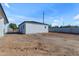 Expansive backyard with newly constructed block fence and home exterior at Xxx S Hunt Hwy, Queen Creek, AZ 85142