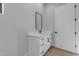 A minimalist bathroom boasts a modern vanity, sleek fixtures, and a bright, airy ambiance at Xxx S Hunt Hwy, Queen Creek, AZ 85142