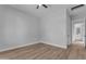 Bright bedroom features wood flooring and ample space at Xxx S Hunt Hwy, Queen Creek, AZ 85142
