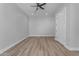 Empty bedroom showcasing wood-look flooring, recessed lighting, a ceiling fan and a closet at Xxx S Hunt Hwy, Queen Creek, AZ 85142