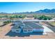 Stunning single-story home with a desert backdrop and a clean, modern design at Xxx S Hunt Hwy, Queen Creek, AZ 85142