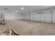 Large garage featuring two white doors and recessed lighting overhead at Xxx S Hunt Hwy, Queen Creek, AZ 85142