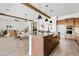 Open concept kitchen with stainless appliances at 10134 E Talon Ave, Mesa, AZ 85212