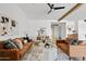 Bright living room features hardwood floors, modern décor, and comfortable seating at 10134 E Talon Ave, Mesa, AZ 85212