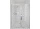 Close up of shower stall featuring tiled walls, shower head and glass door at 10134 E Talon Ave, Mesa, AZ 85212