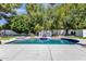 A beautiful backyard with a pool and landscaped areas, providing a private oasis for relaxation at 10360 N 98Th St, Scottsdale, AZ 85258