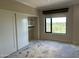Bedroom featuring a closet, view of the golf course, and natural light at 1040 E Osborn Rd # 602, Phoenix, AZ 85014