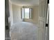 Bedroom with neutral walls, and plantation shutters offering natural light and neighborhood views at 1040 E Osborn Rd # 602, Phoenix, AZ 85014