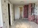 Unfinished bedroom with exposed framing, plumbing, and electrical, prepped for customization at 1040 E Osborn Rd # 602, Phoenix, AZ 85014