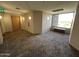 Hallway with seating and large window offering nice natural light at 1040 E Osborn Rd # 602, Phoenix, AZ 85014