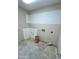 Unfinished laundry room with utility hookups ready for appliances and customization at 1040 E Osborn Rd # 602, Phoenix, AZ 85014