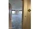 A view of the spacious living room from doorway number 602 at 1040 E Osborn Rd # 602, Phoenix, AZ 85014