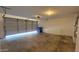 Spacious two car garage with water heater, offering ample parking and storage at 10521 W Toronto Way, Tolleson, AZ 85353