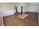 Upstairs loft area with wood-look laminate flooring offering flexible living space at 10521 W Toronto Way, Tolleson, AZ 85353