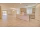 Open floor plan featuring a kitchen with stainless appliances and expansive island with lots of room for entertaining at 1122 E Meadowbrook Dr, Casa Grande, AZ 85122