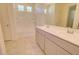 Bathroom features a shower-tub combination and a dual sink vanity with light colored cabinets at 1123 E Meadowbrook Dr, Casa Grande, AZ 85122