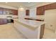 Modern kitchen showcasing stainless steel appliances, granite countertops, and wooden cabinets at 1130 E Atwood Dr, Casa Grande, AZ 85122