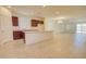 Bright kitchen featuring granite countertops, dark wood cabinets, and a large island at 1130 E Atwood Dr, Casa Grande, AZ 85122