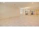 A spacious open-concept living room showcases tiled floors and lots of natural light at 1130 E Meadowbrook Dr, Casa Grande, AZ 85122