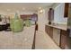 Bright kitchen with granite countertops, stainless appliances, and lots of storage space in rich wood cabinets at 1142 E Atwood Dr, Casa Grande, AZ 85122