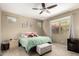 Comfortable bedroom featuring a ceiling fan, neutral walls, and plenty of natural light at 1202 E Binner Dr, Chandler, AZ 85225