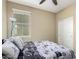 Bedroom featuring a large window, comfortable bed, and a large closet at 1202 E Binner Dr, Chandler, AZ 85225