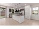 Stylish kitchen with stainless steel appliances, granite counters, and backyard access at 1202 E Binner Dr, Chandler, AZ 85225