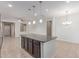 Spacious kitchen with granite countertops, stainless appliances, and pendant lighting above the island at 1202 E Binner Dr, Chandler, AZ 85225