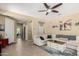 Open-concept living room showcasing the sectional sofa, neutral walls, and access to other rooms at 1202 E Binner Dr, Chandler, AZ 85225