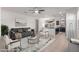 Open-concept living area flowing into kitchen with a modern aesthetic and comfortable seating at 1202 E Binner Dr, Chandler, AZ 85225