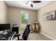 A home office with a large window is a tranquil workspace at 1202 E Binner Dr, Chandler, AZ 85225