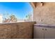 Balcony view showing sky, stucco texture, outdoor storage and lighting fixture at 12221 W Bell Rd # 362, Surprise, AZ 85378