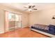 Bright bedroom featuring a sliding glass door for natural light at 12221 W Bell Rd # 362, Surprise, AZ 85378