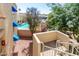 Exterior shot from above overlooking a sparkling community pool, stairs, and awnings at 12221 W Bell Rd # 362, Surprise, AZ 85378