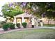 Exterior gazebo in park-like setting with green grass, bushes and trees at 12221 W Bell Rd # 362, Surprise, AZ 85378