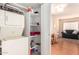 Convenient in-unit laundry room with storage shelves at 12221 W Bell Rd # 362, Surprise, AZ 85378