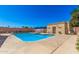 Community pool featuring chairs, tables, jacuzzi and pool house at 12221 W Bell Rd # 362, Surprise, AZ 85378