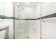 Shower with a bright tile and frameless glass doors at 12221 W Bell Rd # 362, Surprise, AZ 85378