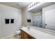Clean bathroom with ample counter space, vanity, and a shower/tub combination with a shower curtain at 1265 S Aaron -- # 277, Mesa, AZ 85209