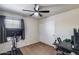 Comfortable bedroom with ceiling fan and sliding closet doors, offering a simple and functional space at 1265 S Aaron -- # 277, Mesa, AZ 85209