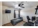 Bright bedroom with a ceiling fan, providing a comfortable and well-lit living space at 1265 S Aaron -- # 277, Mesa, AZ 85209
