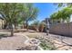 Well-maintained community park with lush landscaping, walking paths, and convenient dog waste station at 1265 S Aaron -- # 277, Mesa, AZ 85209