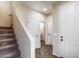Inviting entryway with stairway and tile floors leads to the home's interior spaces at 1265 S Aaron -- # 277, Mesa, AZ 85209