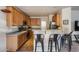 Kitchen features stainless steel appliances and bar seating at 1265 S Aaron -- # 277, Mesa, AZ 85209