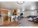 Open-concept living room featuring modern lighting, ceiling fan, and cozy seating at 1265 S Aaron -- # 277, Mesa, AZ 85209