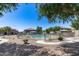 Community pool with lounge chairs and covered seating areas, surrounded by well-maintained landscaping and residences at 1265 S Aaron -- # 277, Mesa, AZ 85209